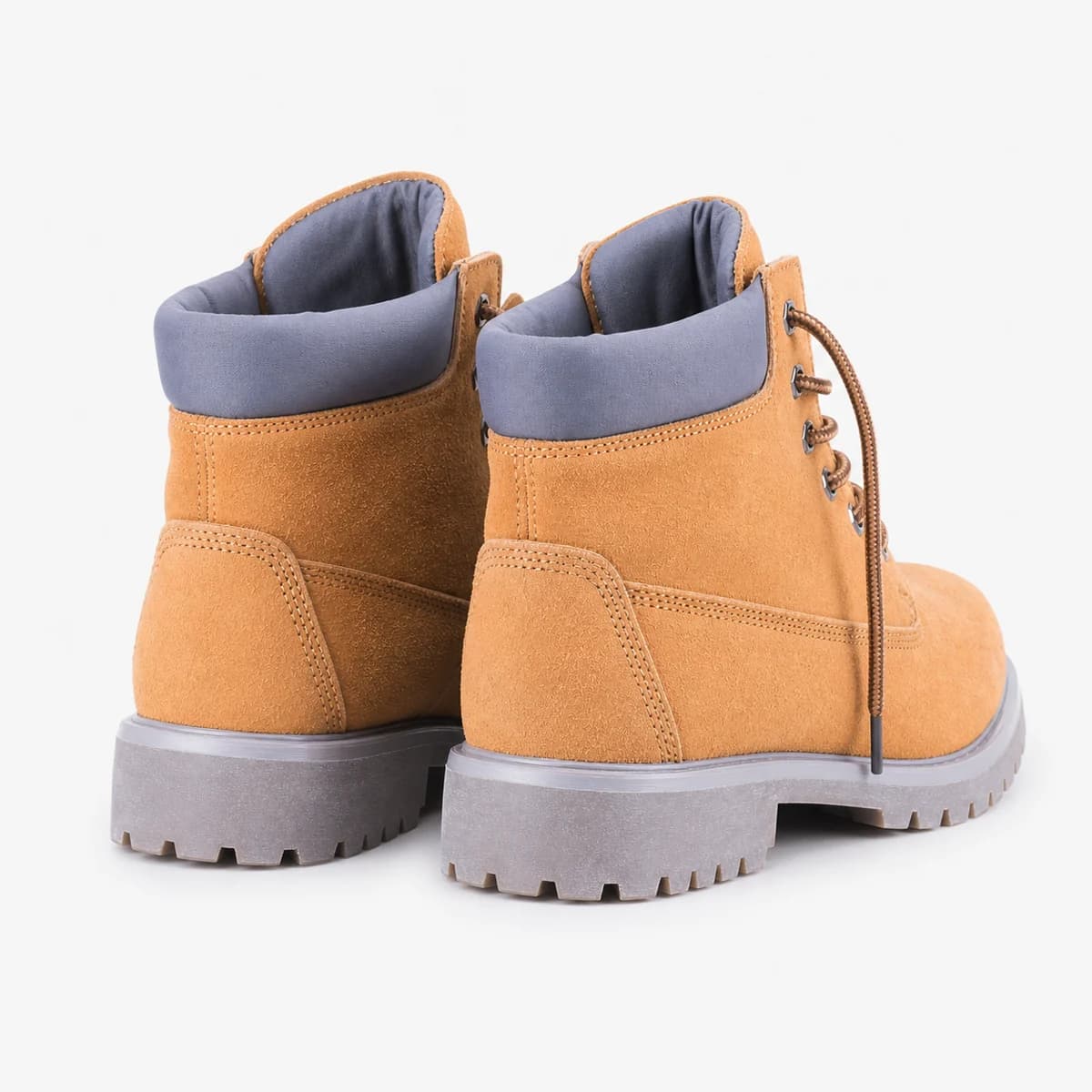 Rear three-quarter view of tan hiking boots showing the padded collars and heel construction