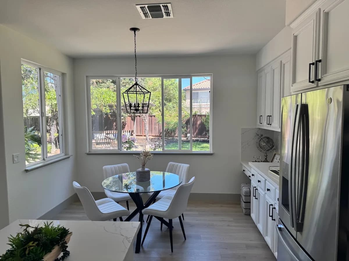 Original kitchen with white dining chairs